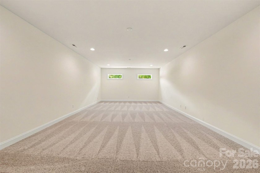 Move-in ready new construction in the gated lakefront community - photo 36