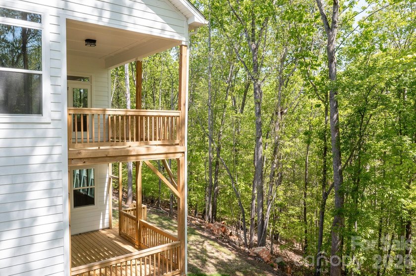 Move-in ready new construction in the gated lakefront community - photo 46