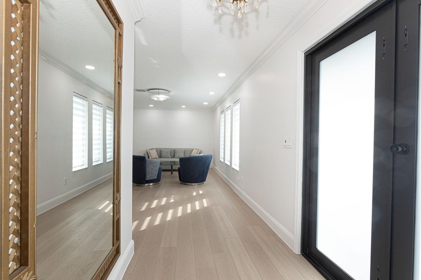Tucked away on an oversized corner lot in the sought-after - photo 10