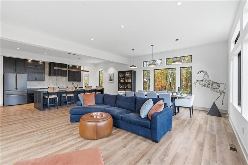 Welcome to a modern masterpiece set on 30-acres that captures - photo 11
