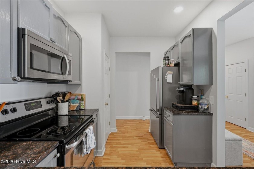 Beautiful 3-bedroom, 2-bath condo ideally located near the - photo 13