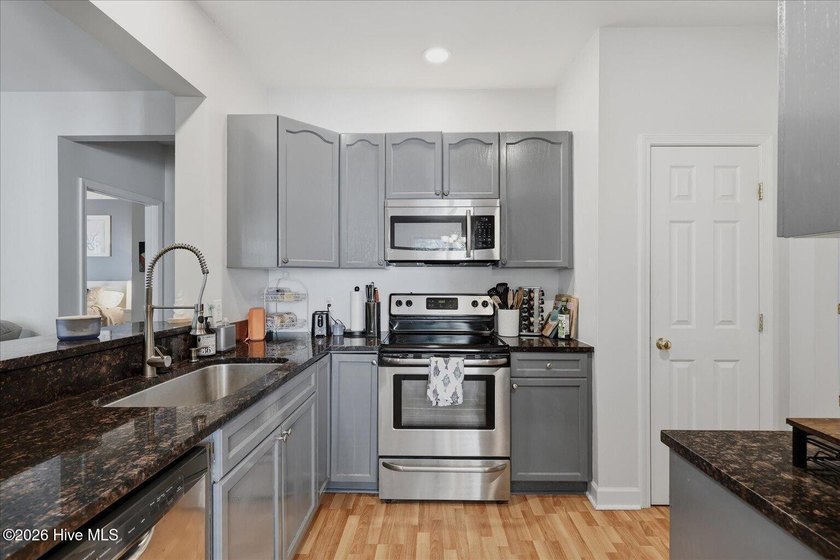 Beautiful 3-bedroom, 2-bath condo ideally located near the - photo 15