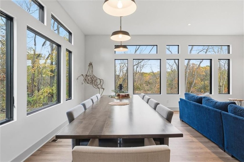 Welcome to a modern masterpiece set on 30-acres that captures - photo 15