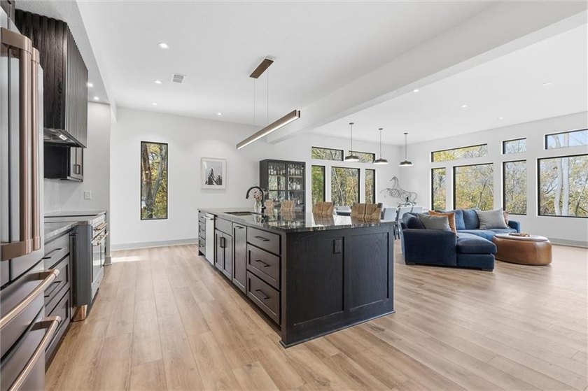 Welcome to a modern masterpiece set on 30-acres that captures - photo 22