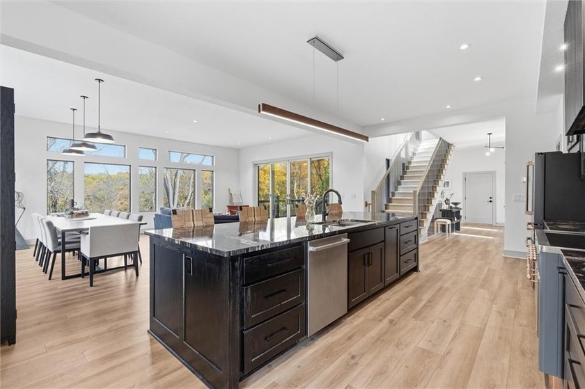Welcome to a modern masterpiece set on 30-acres that captures - photo 23