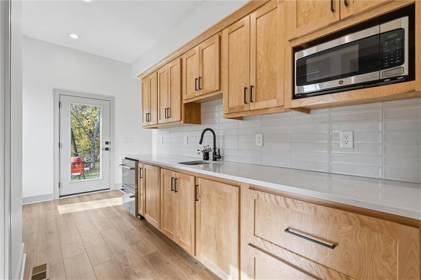 Welcome to a modern masterpiece set on 30-acres that captures - photo 25