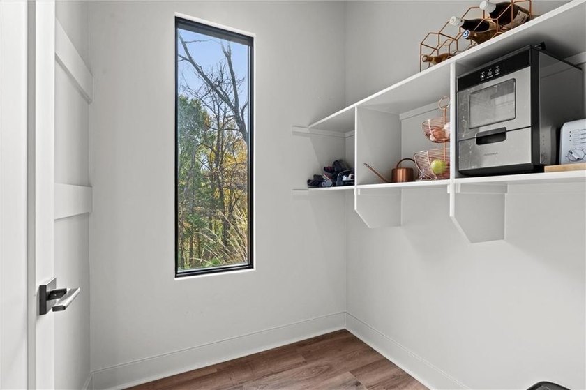 Welcome to a modern masterpiece set on 30-acres that captures - photo 26