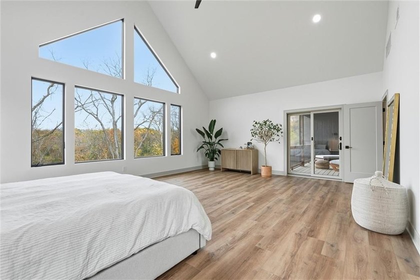 Welcome to a modern masterpiece set on 30-acres that captures - photo 31