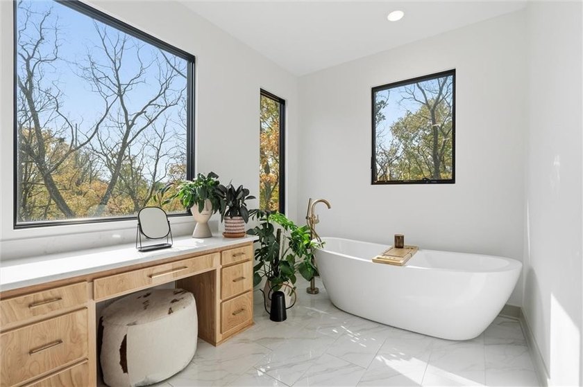 Welcome to a modern masterpiece set on 30-acres that captures - photo 36