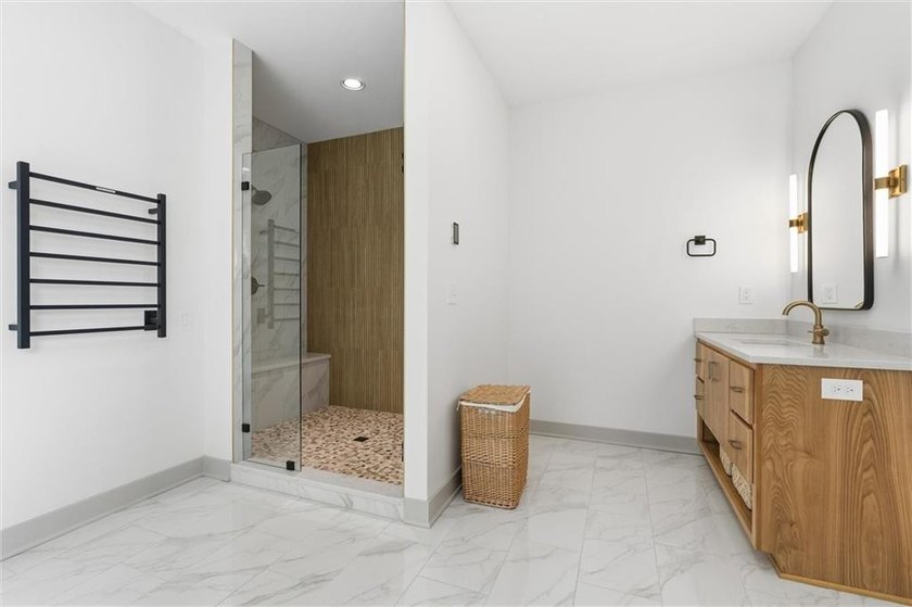 Welcome to a modern masterpiece set on 30-acres that captures - photo 37