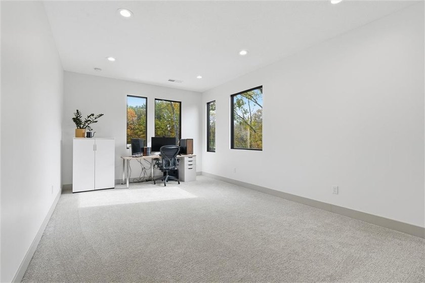 Welcome to a modern masterpiece set on 30-acres that captures - photo 42