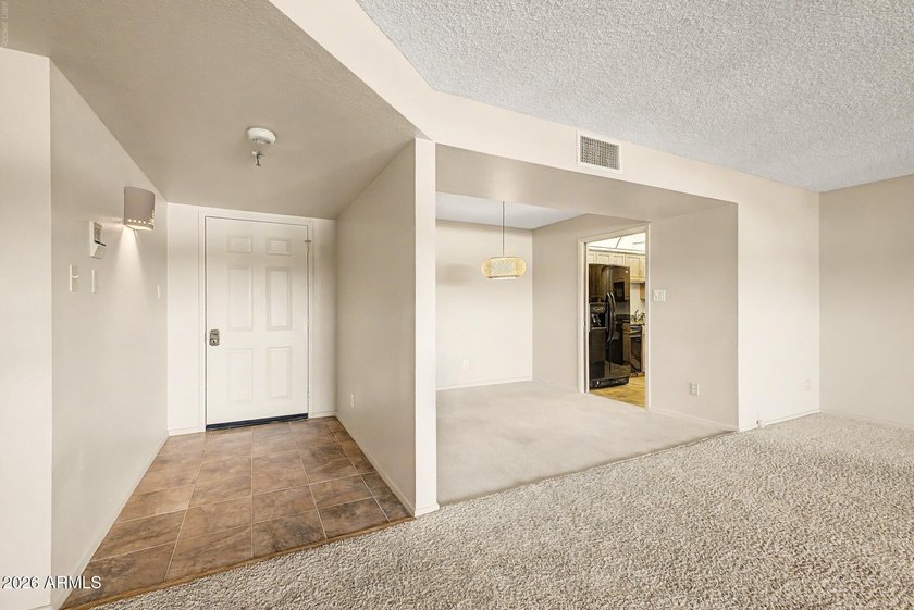 Step into a beautifully upgraded 3rd-floor condo featuring - photo 4