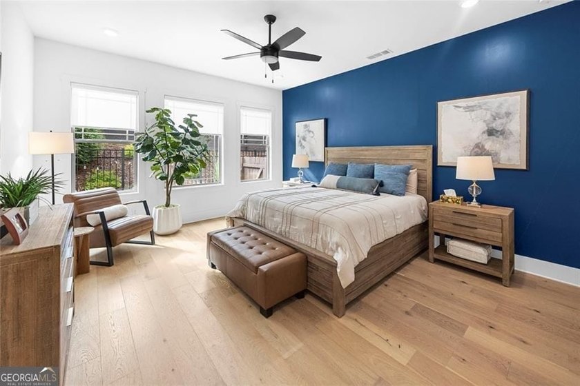 Tucked in the heart of Bridgemill, this luxury townhome lives - photo 13