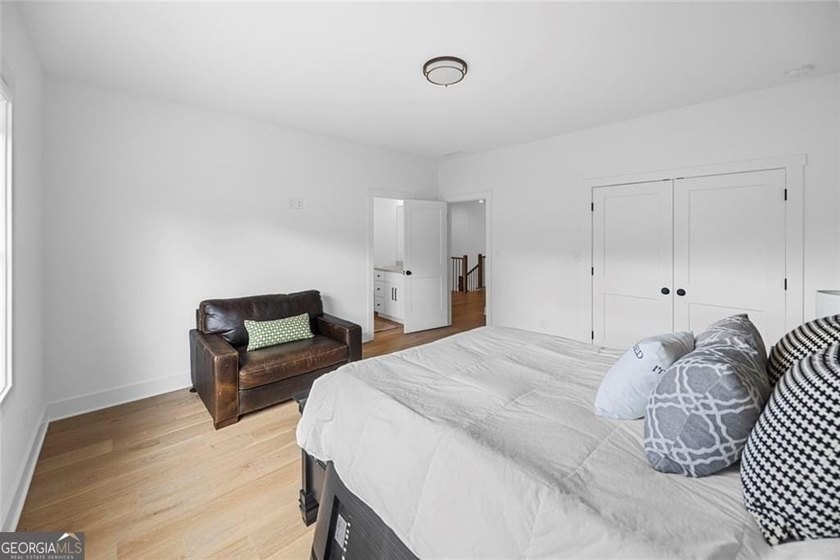 Tucked in the heart of Bridgemill, this luxury townhome lives - photo 25