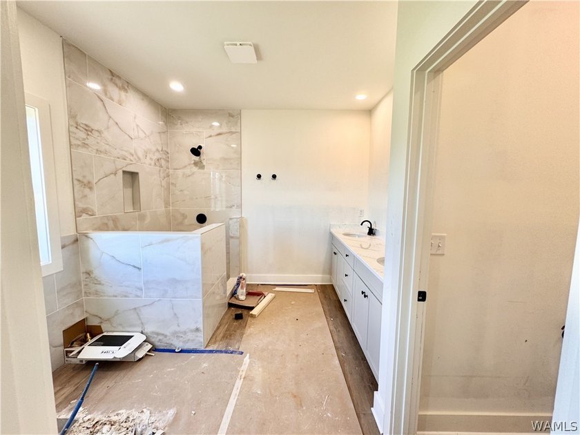 Your brand new home in Neptune's Cove is under construction with - photo 13