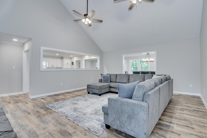 Located just 20 minutes from Evans, this updated Modoc lakehouse - photo 11