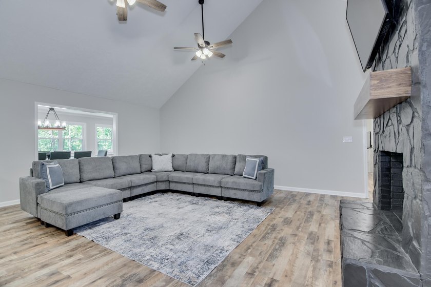 Located just 20 minutes from Evans, this updated Modoc lakehouse - photo 12
