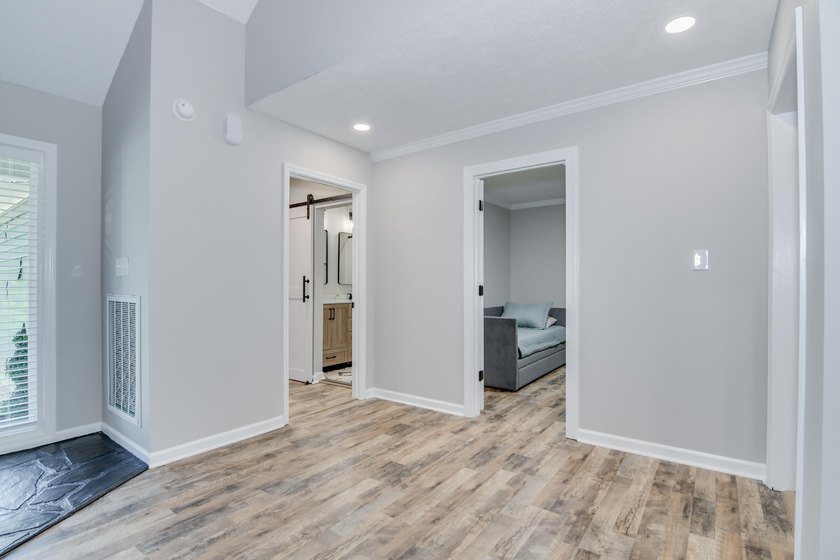 Located just 20 minutes from Evans, this updated Modoc lakehouse - photo 16