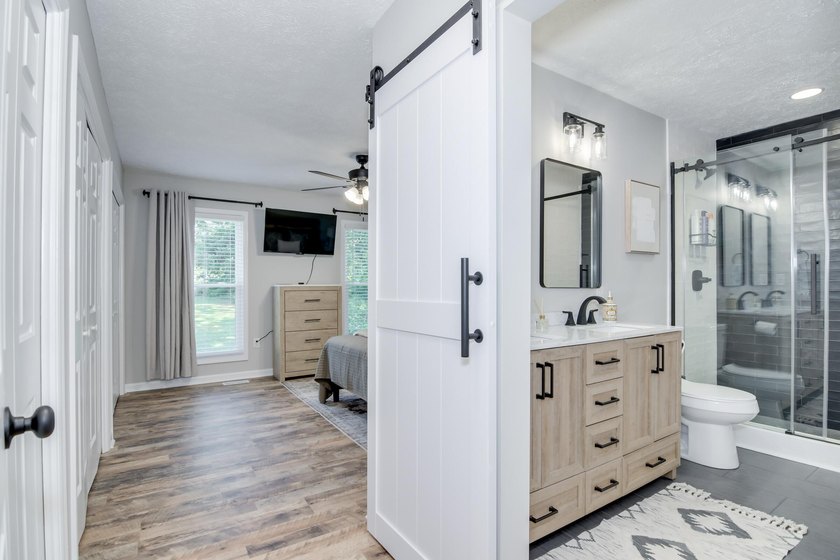 Located just 20 minutes from Evans, this updated Modoc lakehouse - photo 17