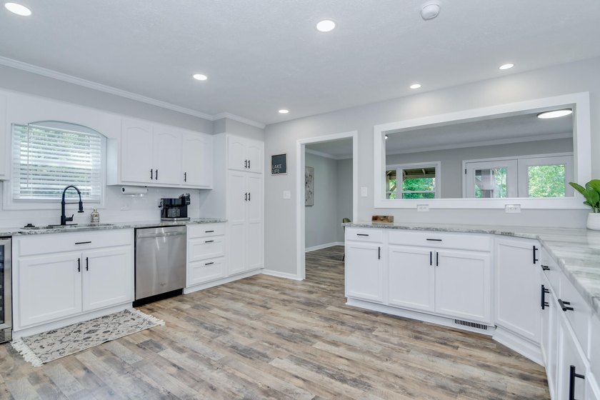 Located just 20 minutes from Evans, this updated Modoc lakehouse - photo 24