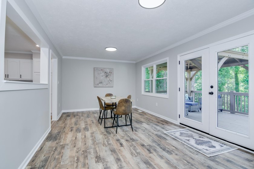 Located just 20 minutes from Evans, this updated Modoc lakehouse - photo 30