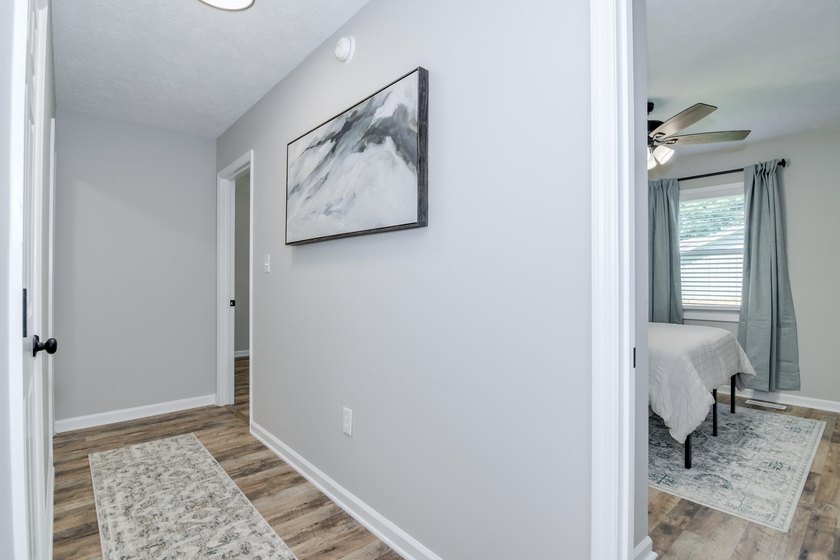 Located just 20 minutes from Evans, this updated Modoc lakehouse - photo 40