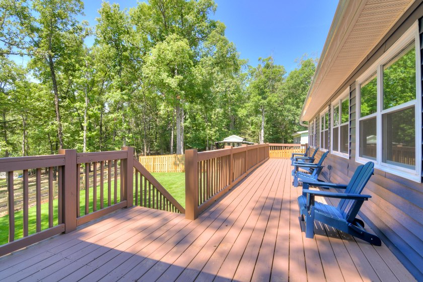 Located just 20 minutes from Evans, this updated Modoc lakehouse - photo 49
