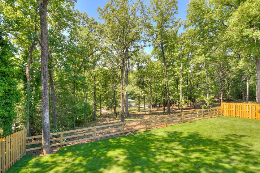 Located just 20 minutes from Evans, this updated Modoc lakehouse - photo 50