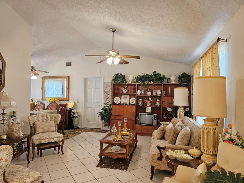 Welcome home to this well-maintained 3 B/R, 2 BA with a 2 car - photo 6