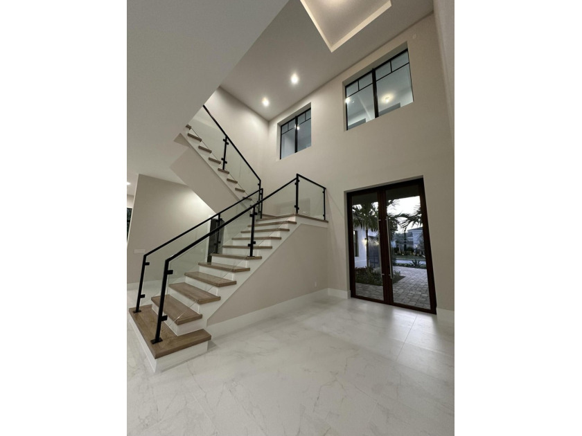 NO EXPENSE OR DETAIL SPARED IN OUR LARGEST ESTATE HOME IN CORAL - photo 6