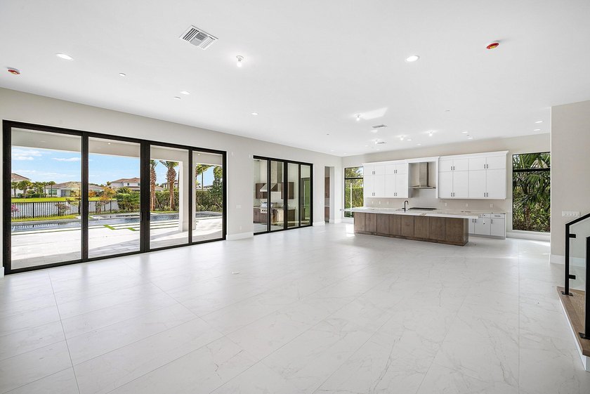 NO EXPENSE OR DETAIL SPARED IN OUR LARGEST ESTATE HOME IN CORAL - photo 9