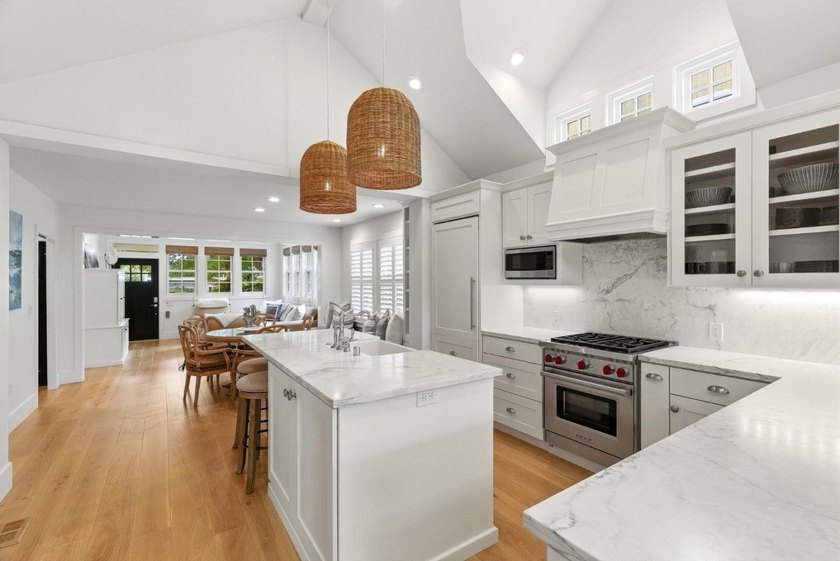 Experience refined coastal living in this fully remodeled beach - photo 3