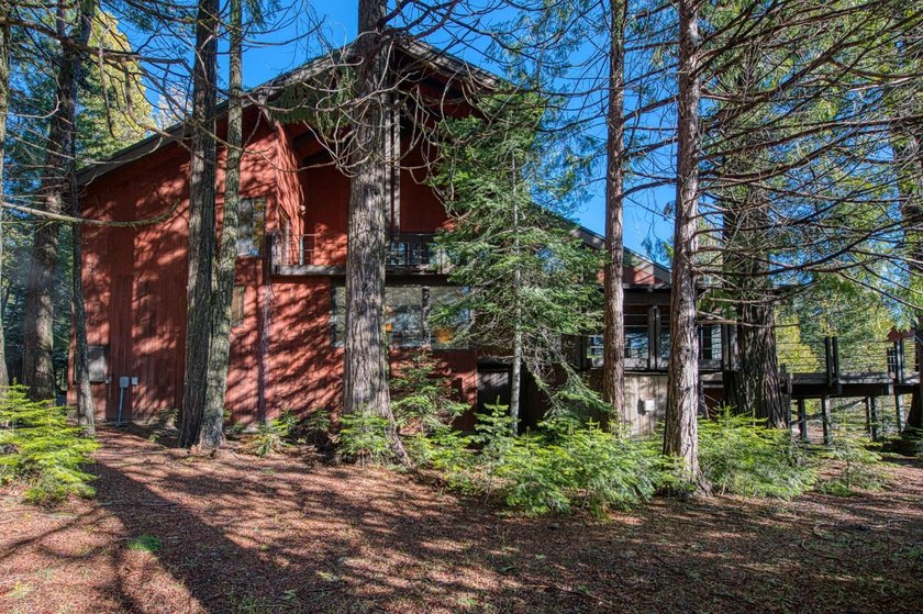 Nestled on over one-acre in the picturesque - photo 3