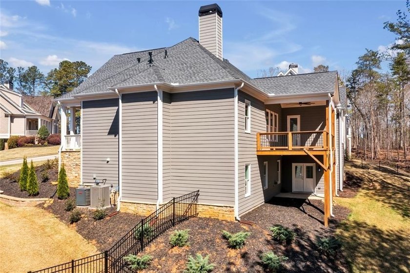 Nestled in the highly sought-after Chestatee Lake &amp; Golf - photo 7