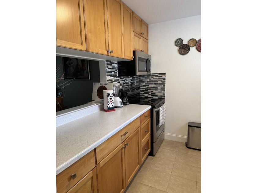 Welcome to this two-bedroom, two-bathroom condominium in - photo 7