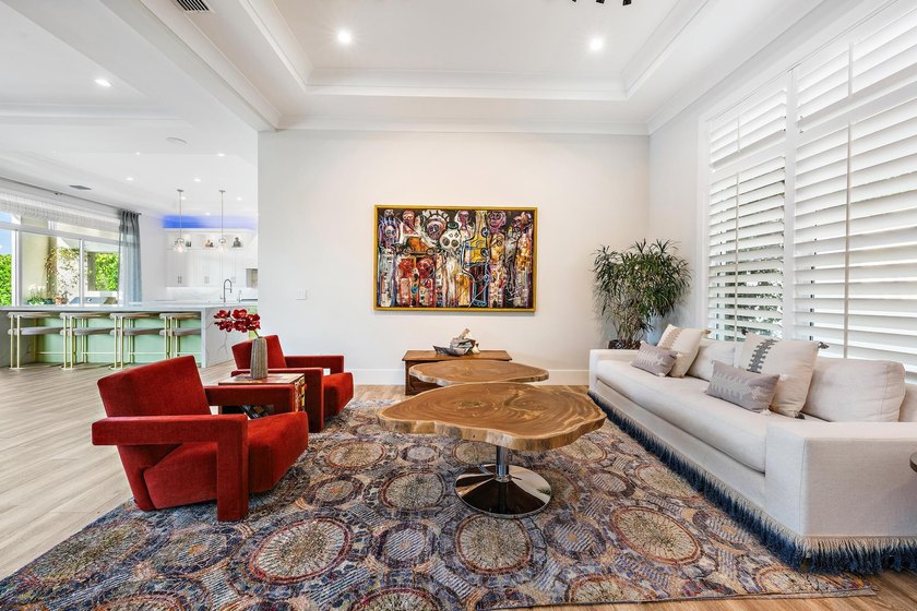 A statement of modern waterfront luxury, this extraordinary - photo 5