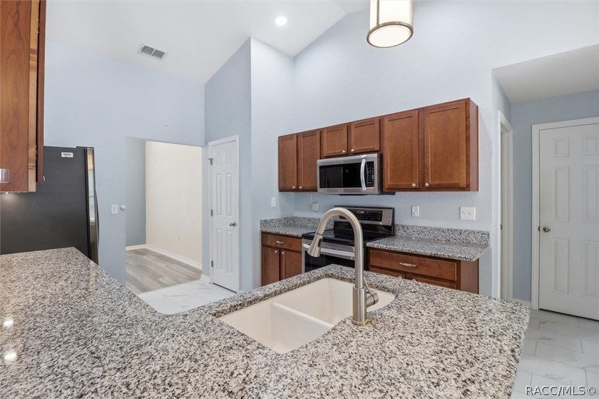 Beautifully updated, this 4-bedroom plus office pool home is - photo 19