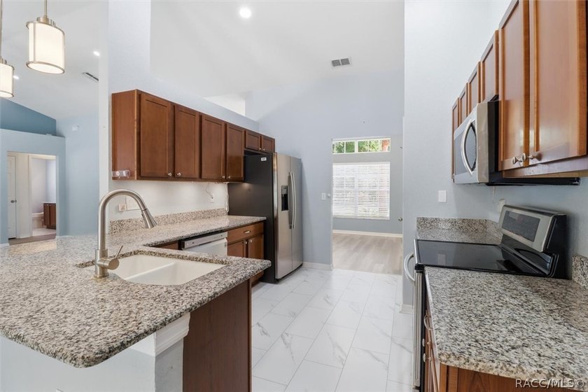 Beautifully updated, this 4-bedroom plus office pool home is - photo 20