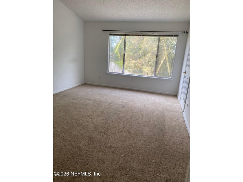 This spacious end-unit condo offers an inviting open floor plan - photo 21