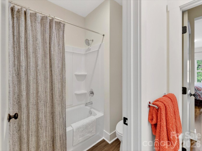 Nestled on a private, wooded lot in desirable Falls Cove near - photo 32