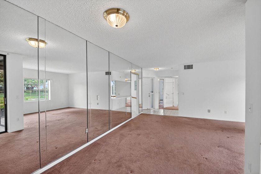 Create your own masterpiece in this spacious first floor lake - photo 7