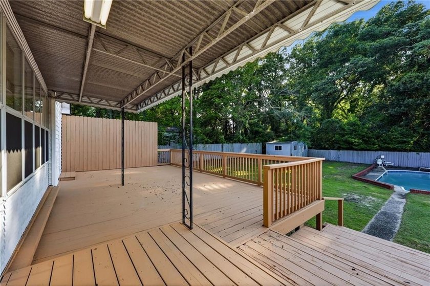 Dive in to your own private backyard oasis. Nestled in the - photo 25