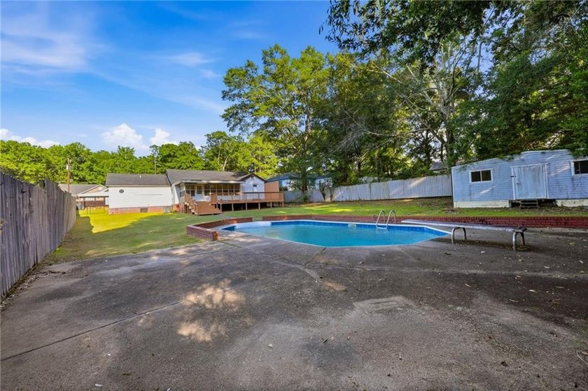 Dive in to your own private backyard oasis. Nestled in the - photo 29