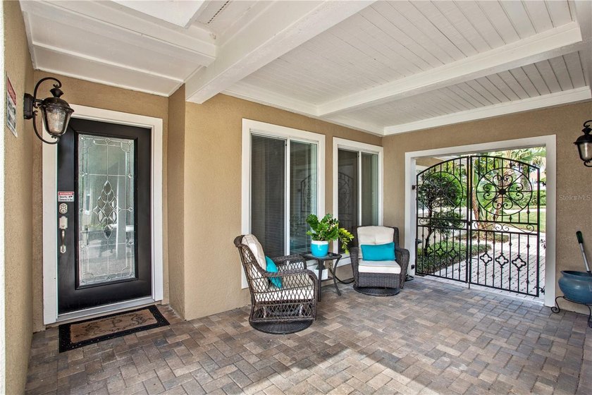 JUST REDUCED! This UNIQUE CUSTOM BUILT LAKEFRONT HOME IS LOCATED - photo 2