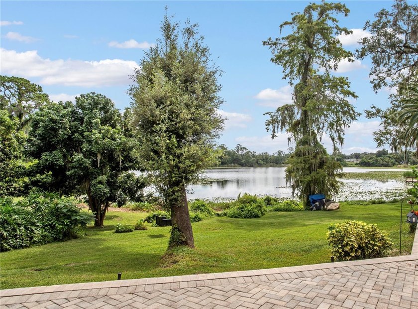JUST REDUCED! This UNIQUE CUSTOM BUILT LAKEFRONT HOME IS LOCATED - photo 3