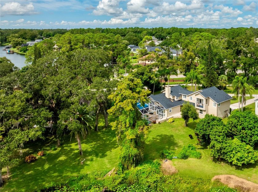 JUST REDUCED! This UNIQUE CUSTOM BUILT LAKEFRONT HOME IS LOCATED - photo 4