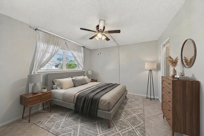 LOVELY EAST FACING UPDATED 2/2 second floor garden view unit in - photo 4