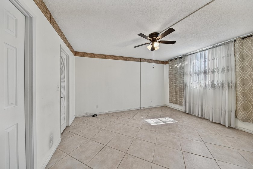 LOVELY EAST FACING UPDATED 2/2 second floor garden view unit in - photo 5
