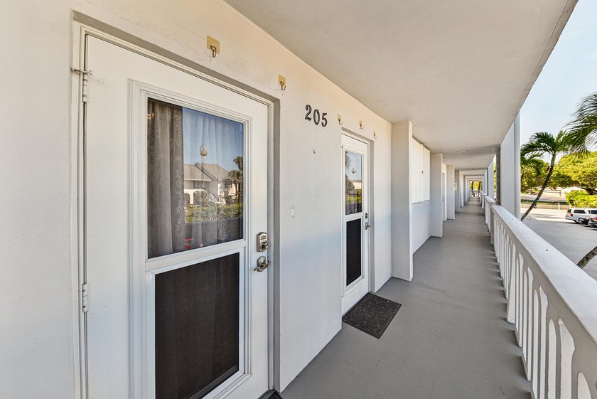LOVELY EAST FACING UPDATED 2/2 second floor garden view unit in - photo 6