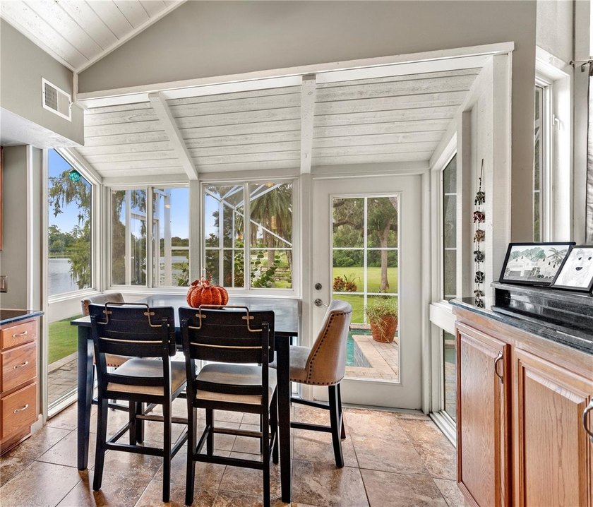 JUST REDUCED! This UNIQUE CUSTOM BUILT LAKEFRONT HOME IS LOCATED - photo 7